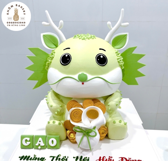 Bánh thôi nôi chú rồng màu xanh