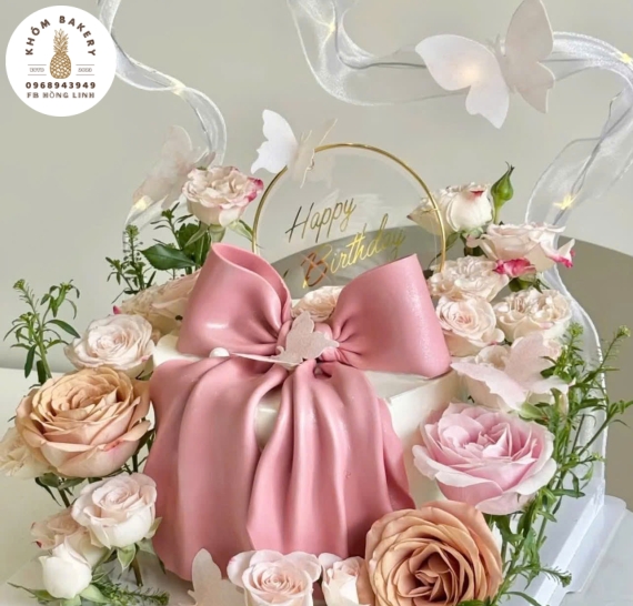 Bánh kem tạo hình nơ 3D tone hồng cho nữ kèm hoa tươi 