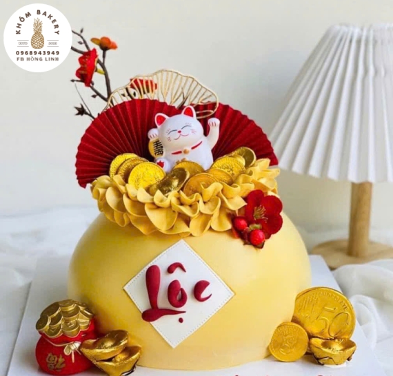 Bánh kem khai trương chữ lộc tone vàng