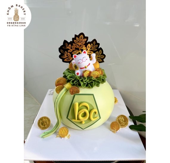 Bánh kem khai trương chữ lộc màu xanh