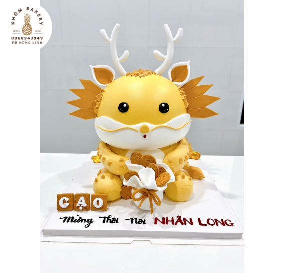 Bánh thôi nôi chú rồng màu vàng