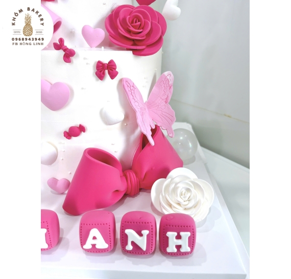Bánh Kem thôi nôi đầy tháng dành cho bé gái 2 tầng tone hồng