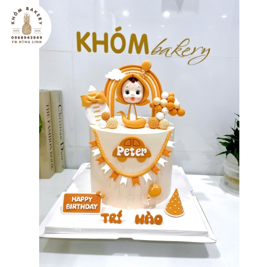 Bánh kem thôi nôi dành cho bé trai tuổi tỵ hot 2026 tone cam