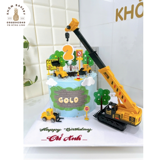 Bánh kem dành tặng cho bé trai yêu thích xe công trình lên 2 tuổi 
